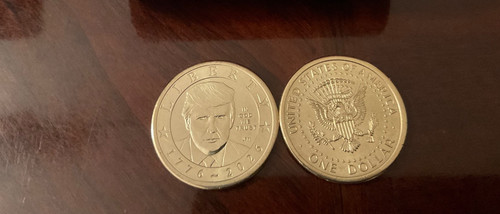Due monete dollaro - da, un
